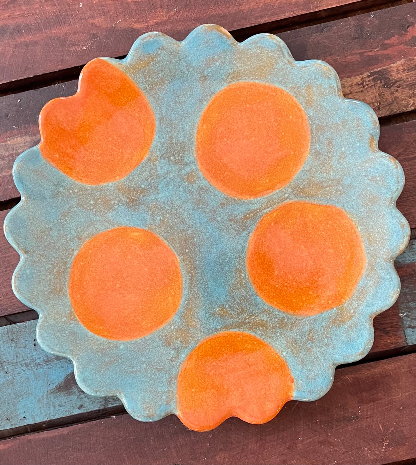 TurquoiseScalloped orange polka dot plate
