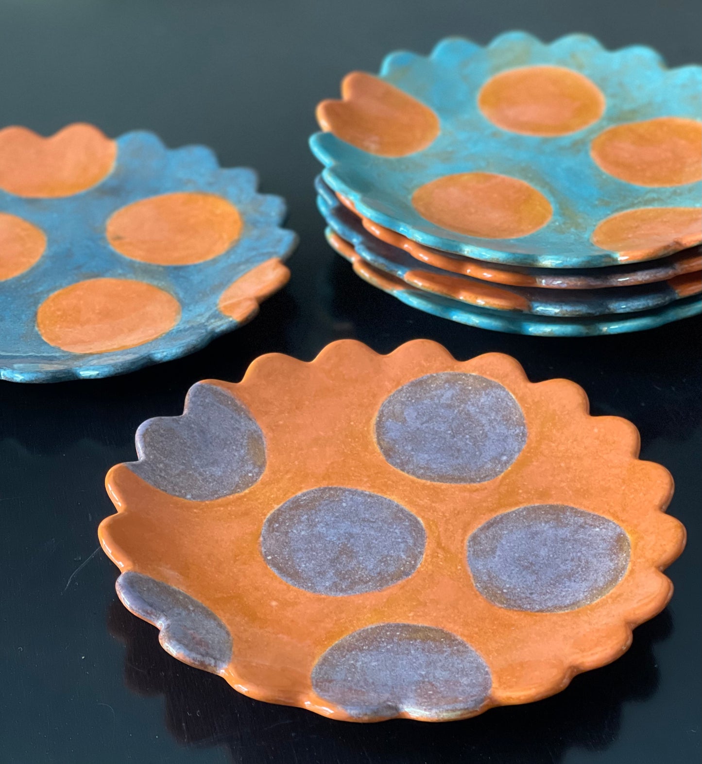 TurquoiseScalloped orange polka dot plate