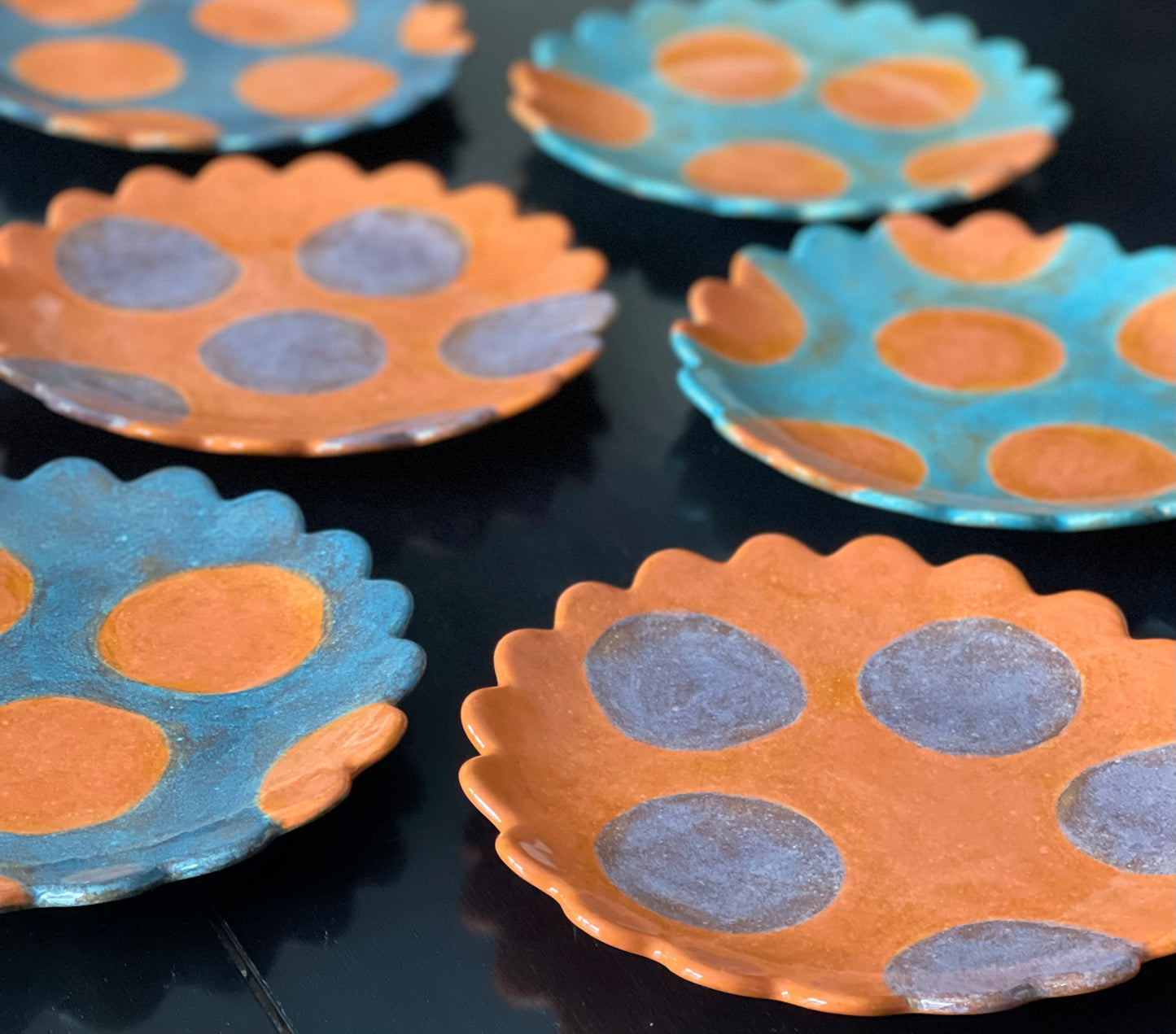 TurquoiseScalloped orange polka dot plate